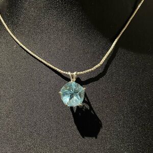 Elegant Silver Necklace with Blue Pendant Texas star